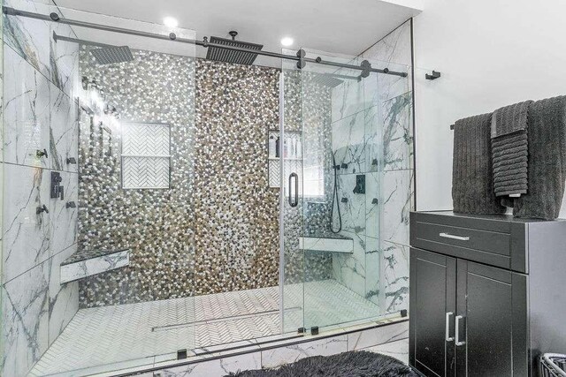 bathroom with vanity and walk in shower