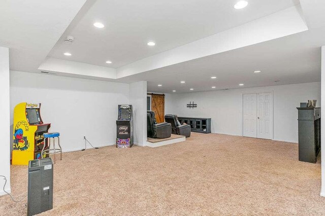 basement with light colored carpet