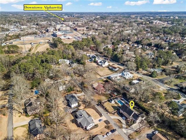view of property location featuring nearby suburban area