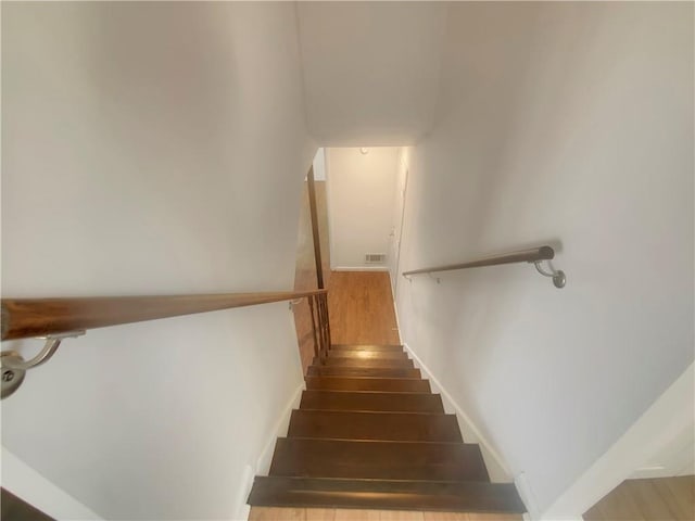2217 Troutdale Dr, Decatur, GA 30032 - staircase with visible vents and wood finished floors
