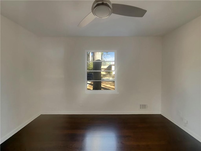 2217 Troutdale Dr, Decatur, GA 30032 - spare room featuring baseboards, visible vents, dark wood finished floors, and a ceiling fan