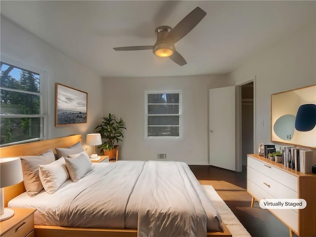 2217 Troutdale Dr, Decatur, GA 30032 - bedroom with a ceiling fan, visible vents, and wood finished floors