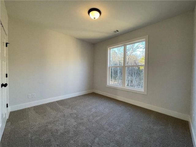 3605 Garden Lakes Pkwy NW, Rome, GA 30165 - empty room featuring baseboards and dark carpet