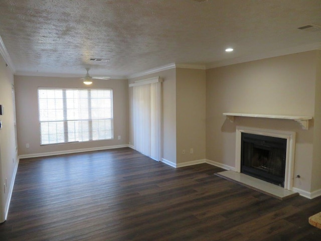 unfurnished living room featuring ceiling fan, ornamental molding, dark hardwood / wood-style floors, and a textured ceiling