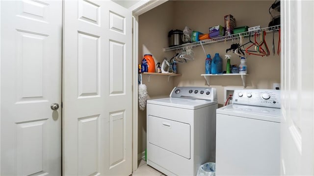 washroom featuring independent washer and dryer