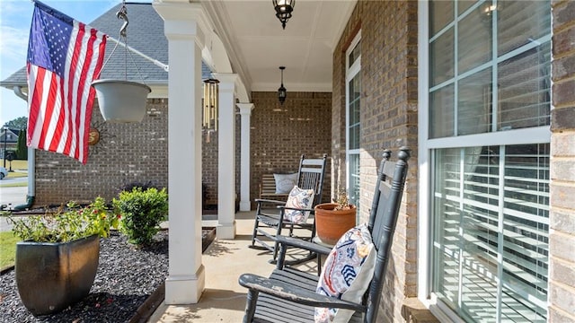 view of patio featuring a porch