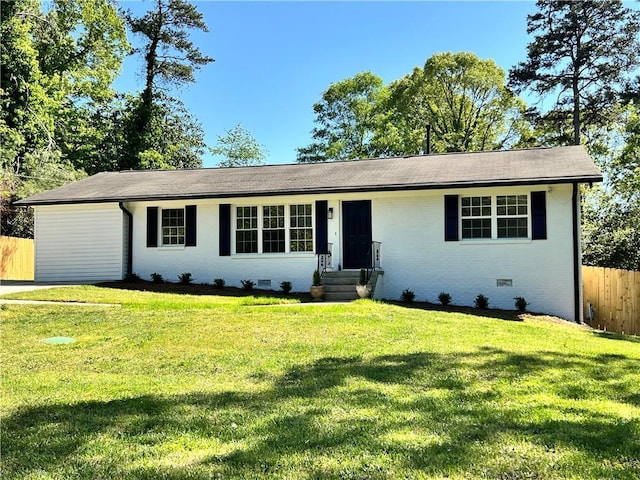 ranch-style house with brick siding, a front lawn, fence, and crawl space