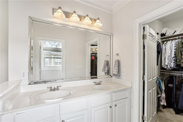 bathroom featuring vanity and crown molding