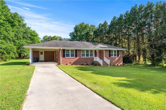 156 Ridgeway St, Winder, GA 30680 - single story home featuring concrete driveway, crawl space, a carport, a front yard, and brick siding