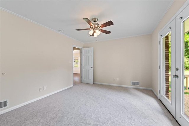 156 Ridgeway St, Winder, GA 30680 - spare room with light carpet, a ceiling fan, ornamental molding, baseboards, and a smoke detector