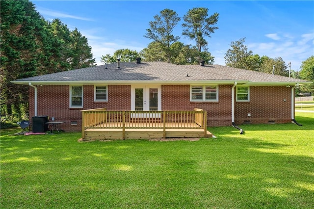 156 Ridgeway St, Winder, GA 30680 - back of property featuring a wooden deck, brick siding, central AC unit, crawl space, and a yard