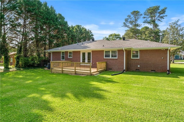 156 Ridgeway St, Winder, GA 30680 - rear view of property with a deck, crawl space, a lawn, brick siding, and french doors