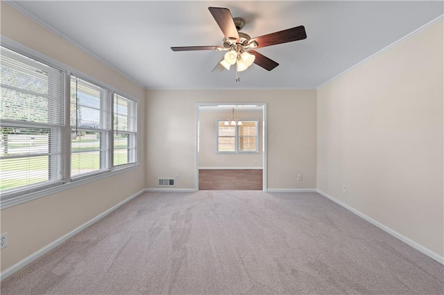 156 Ridgeway St, Winder, GA 30680 - spare room with plenty of natural light, crown molding, ceiling fan, carpet, and baseboards
