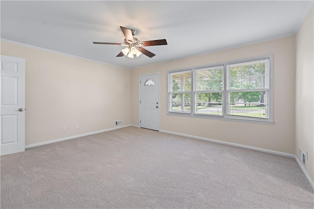 156 Ridgeway St, Winder, GA 30680 - unfurnished room featuring ceiling fan, light carpet, ornamental molding, and baseboards