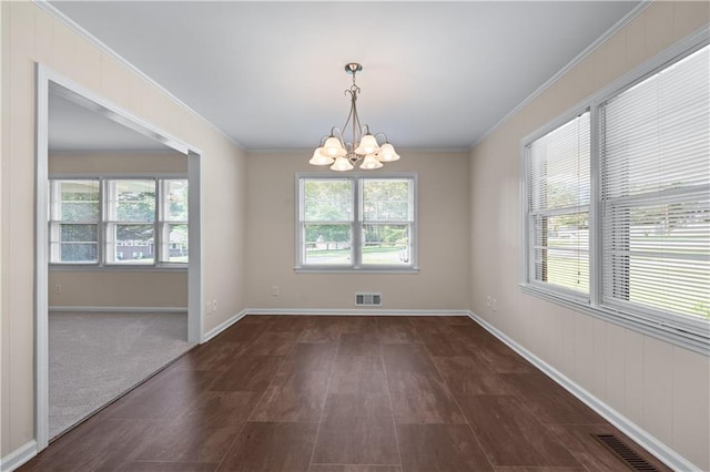 156 Ridgeway St, Winder, GA 30680 - empty room featuring a chandelier, crown molding, and baseboards