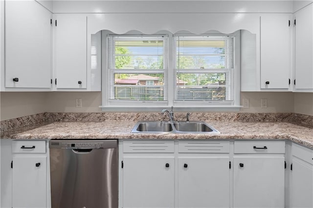 156 Ridgeway St, Winder, GA 30680 - kitchen featuring dishwasher, a sink, white cabinets, and light countertops