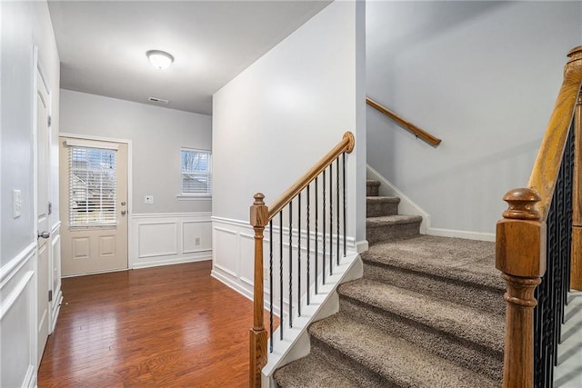 entrance foyer with dark hardwood / wood-style flooring