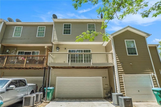 234 Riverstone Commons Cir, Canton, GA 30114 - rear view of property featuring a garage, concrete driveway, and a balcony