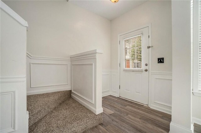 234 Riverstone Commons Cir, Canton, GA 30114 - entrance foyer featuring a decorative wall, wood finished floors, and wainscoting