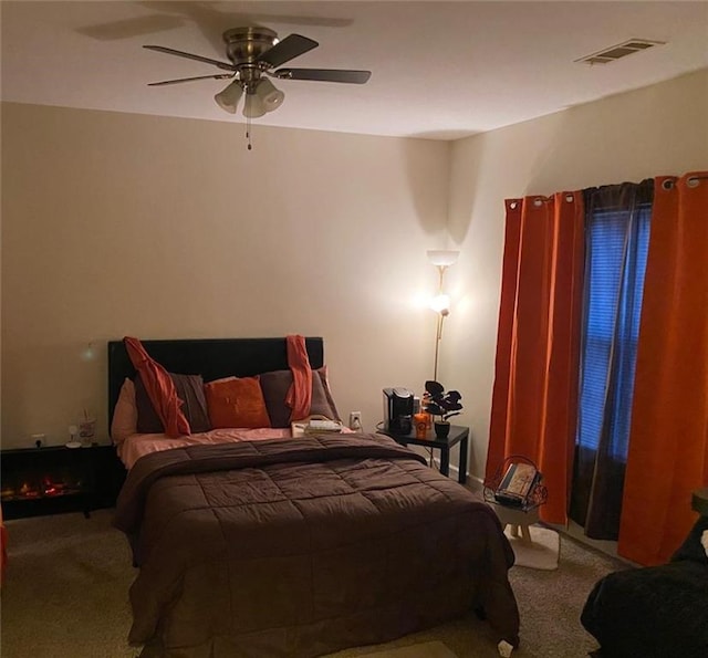 bedroom with carpet floors and ceiling fan