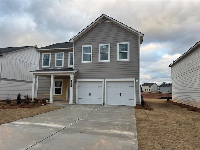 view of front of property with a garage