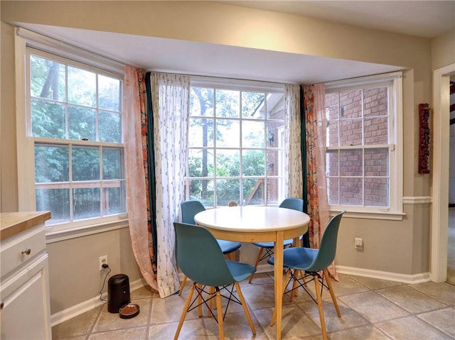 1257 Independence Way, Marietta, GA 30062 - dining space featuring baseboards and light tile patterned floors