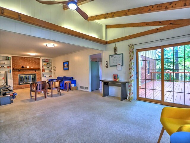 living area with vaulted ceiling with beams, a ceiling fan, carpet flooring, and visible vents