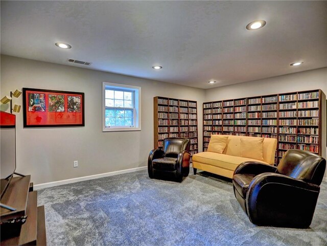 living area with visible vents, carpet flooring, and recessed lighting