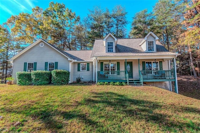 cape cod-style house featuring a porch and a front yard