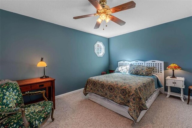 bedroom featuring carpet and ceiling fan