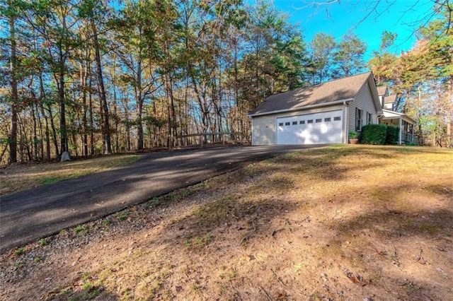 view of home's exterior featuring a garage