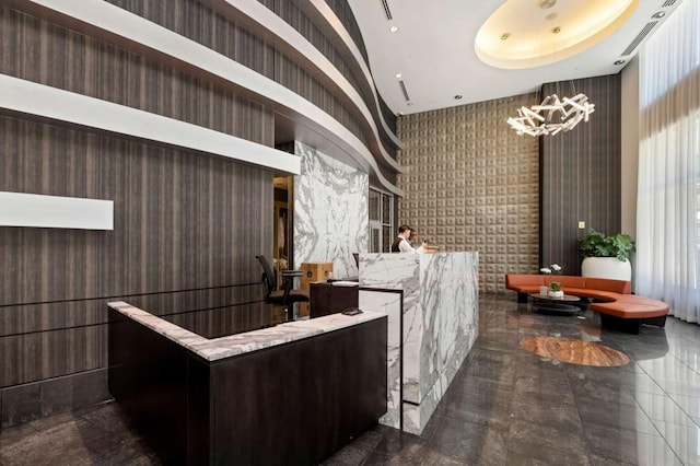 1080 Peachtree St NE Unit 1909, Atlanta, GA 30309 - reception area with an inviting chandelier
