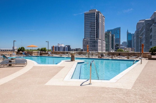 1080 Peachtree St NE Unit 1909, Atlanta, GA 30309 - pool featuring a city view and a patio area