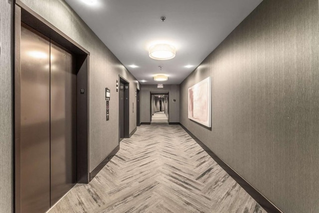 1080 Peachtree St NE Unit 1909, Atlanta, GA 30309 - hall featuring baseboards and elevator