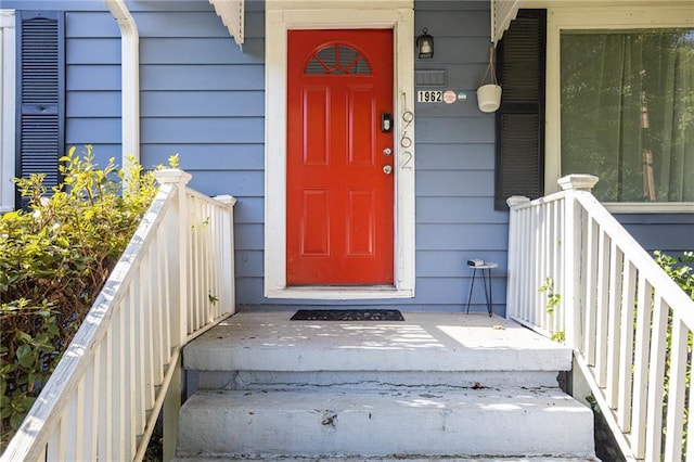 property entrance featuring covered porch