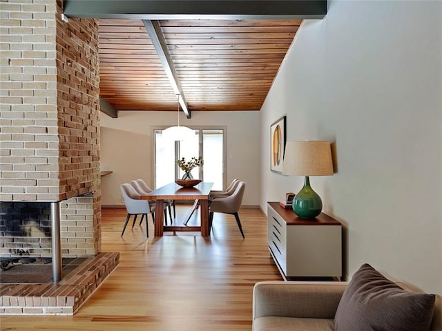 3861 Foxford Dr, Atlanta, GA 30340 - dining area featuring wooden ceiling, light wood-type flooring, and a fireplace