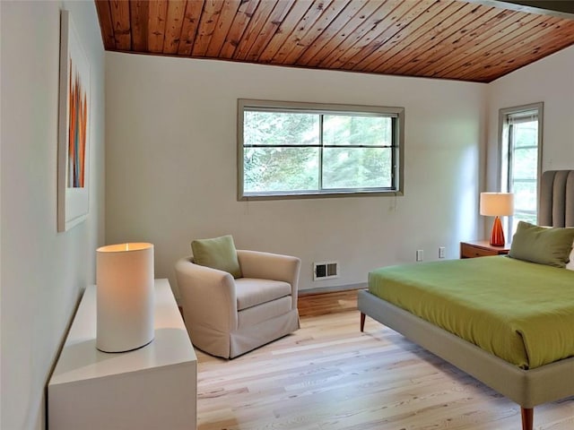 3861 Foxford Dr, Atlanta, GA 30340 - bedroom featuring wood ceiling, light wood-style flooring, and baseboards