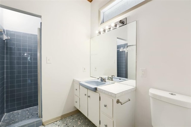 3861 Foxford Dr, Atlanta, GA 30340 - full bathroom featuring vanity, a tile shower, toilet, and tile patterned floors