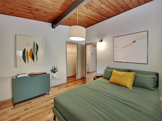 3861 Foxford Dr, Atlanta, GA 30340 - bedroom featuring wood ceiling with exposed beams, light wood-style floors, and baseboards