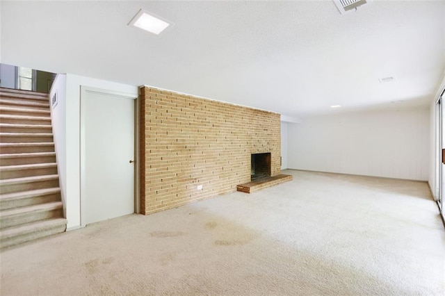 3861 Foxford Dr, Atlanta, GA 30340 - unfurnished living room with stairs, carpet floors, and a fireplace