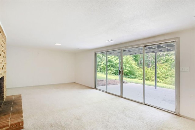3861 Foxford Dr, Atlanta, GA 30340 - unfurnished living room featuring carpet floors and a fireplace