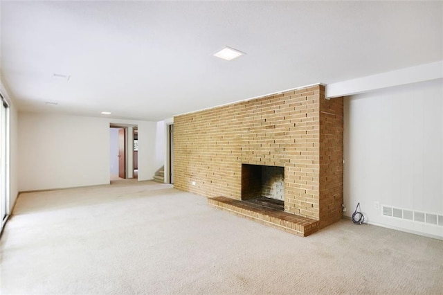 3861 Foxford Dr, Atlanta, GA 30340 - unfurnished living room featuring stairway, carpet floors, and a brick fireplace