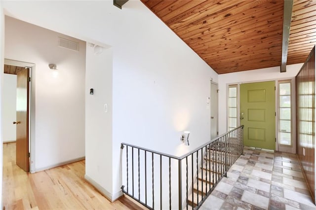 3861 Foxford Dr, Atlanta, GA 30340 - entryway featuring wood ceiling, lofted ceiling, and baseboards