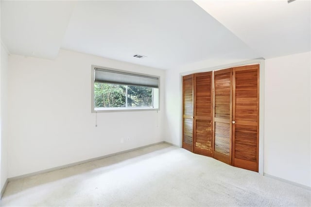 3861 Foxford Dr, Atlanta, GA 30340 - unfurnished bedroom with carpet, a closet, and baseboards