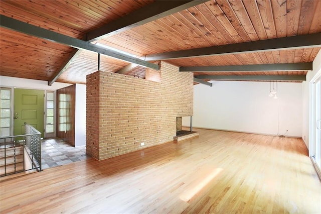 3861 Foxford Dr, Atlanta, GA 30340 - unfurnished living room with wood finished floors, wooden ceiling, and a brick fireplace