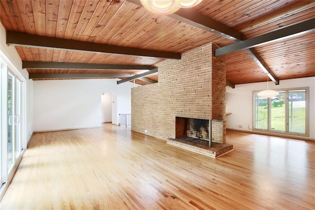 3861 Foxford Dr, Atlanta, GA 30340 - unfurnished living room with wood finished floors, wood ceiling, and a brick fireplace
