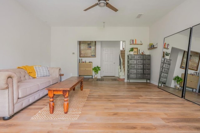 2045 Bethany Spring Trce, Cumming, GA 30041 - living area with ceiling fan and wood finished floors