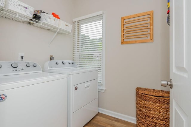 2045 Bethany Spring Trce, Cumming, GA 30041 - laundry area with separate washer and dryer and light wood-type flooring