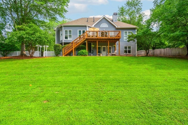 2045 Bethany Spring Trce, Cumming, GA 30041 - rear view of property featuring a wooden deck, stairs, a chimney, and a fenced backyard