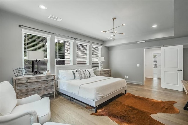 2809 Glenwood Ave SE, Atlanta, GA 30317 - bedroom featuring light wood finished floors, a chandelier, baseboards, and recessed lighting